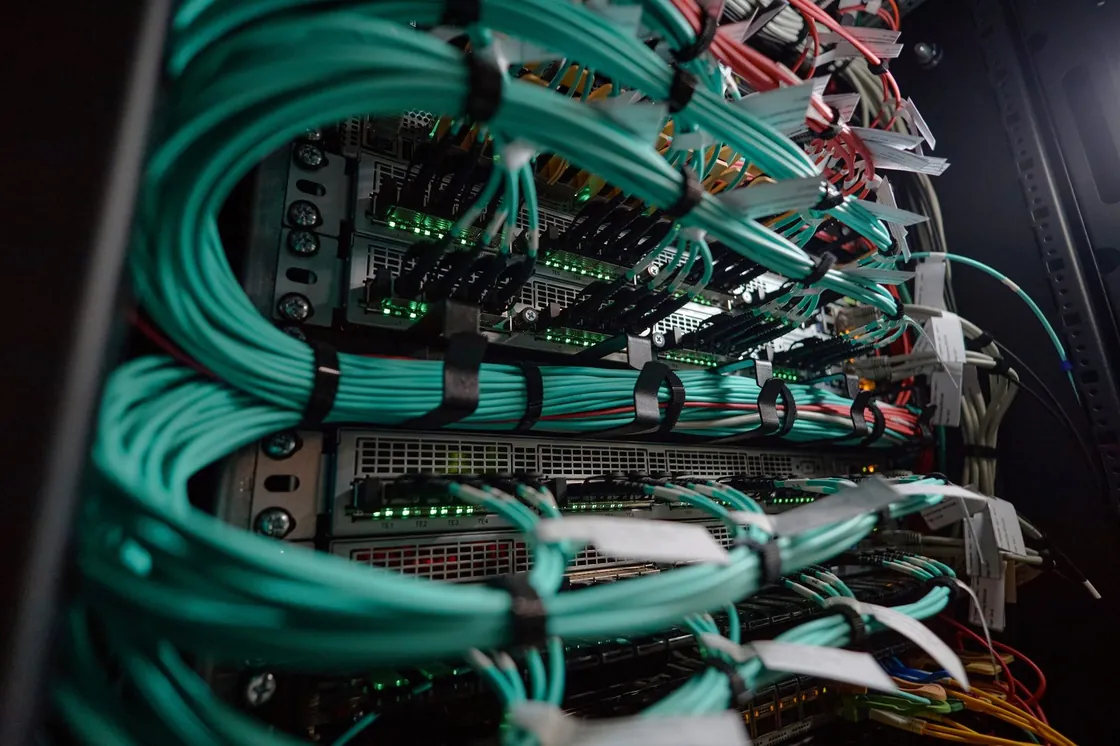 Network cables and servers in a rack.